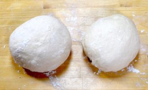 Two rounded pieces of dough